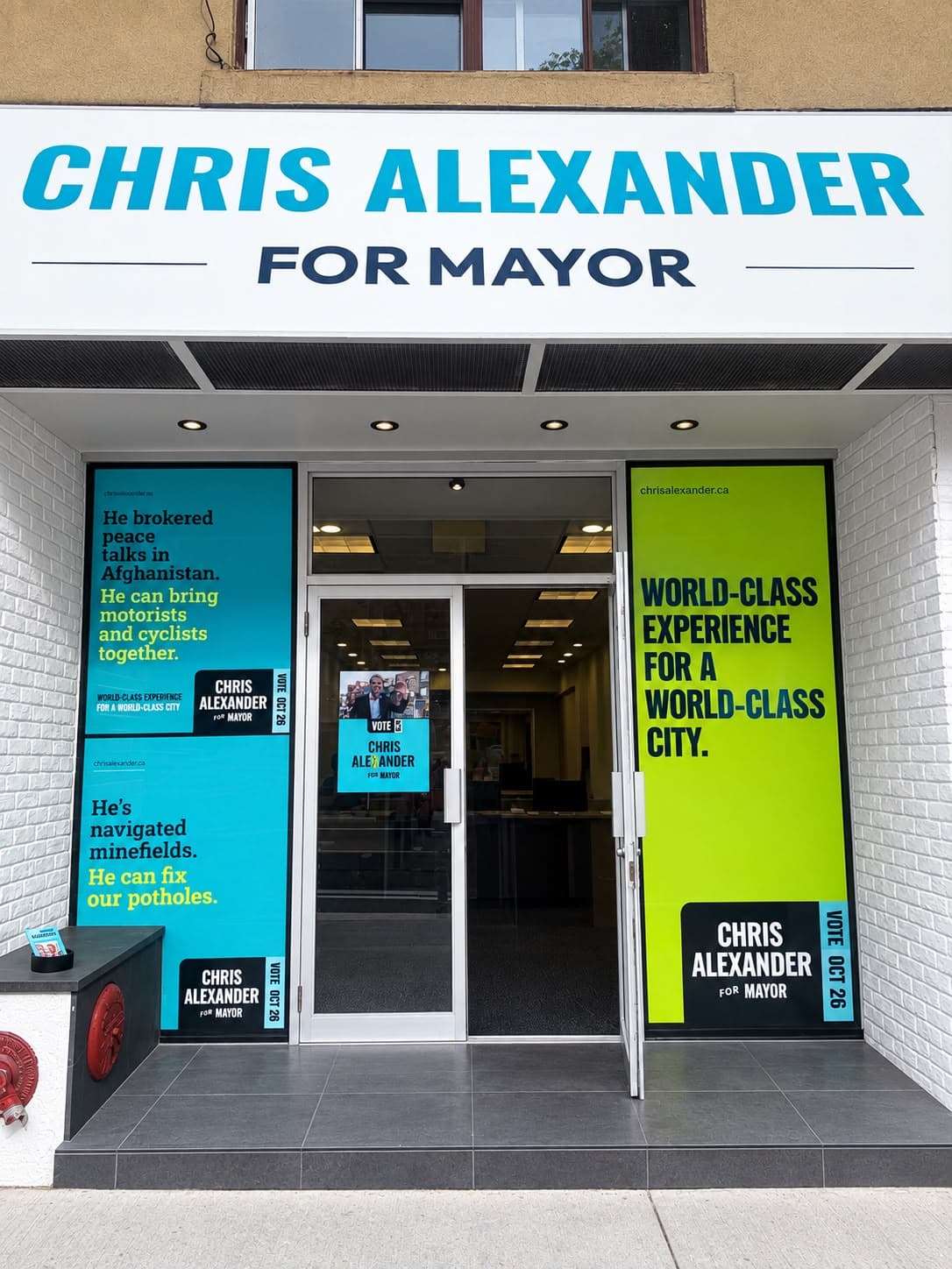 The campaign office on Yonge Street, its windows carrying Chris Alexander for Mayor signage.