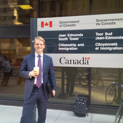 Chris Alexander at an immigration policy forum